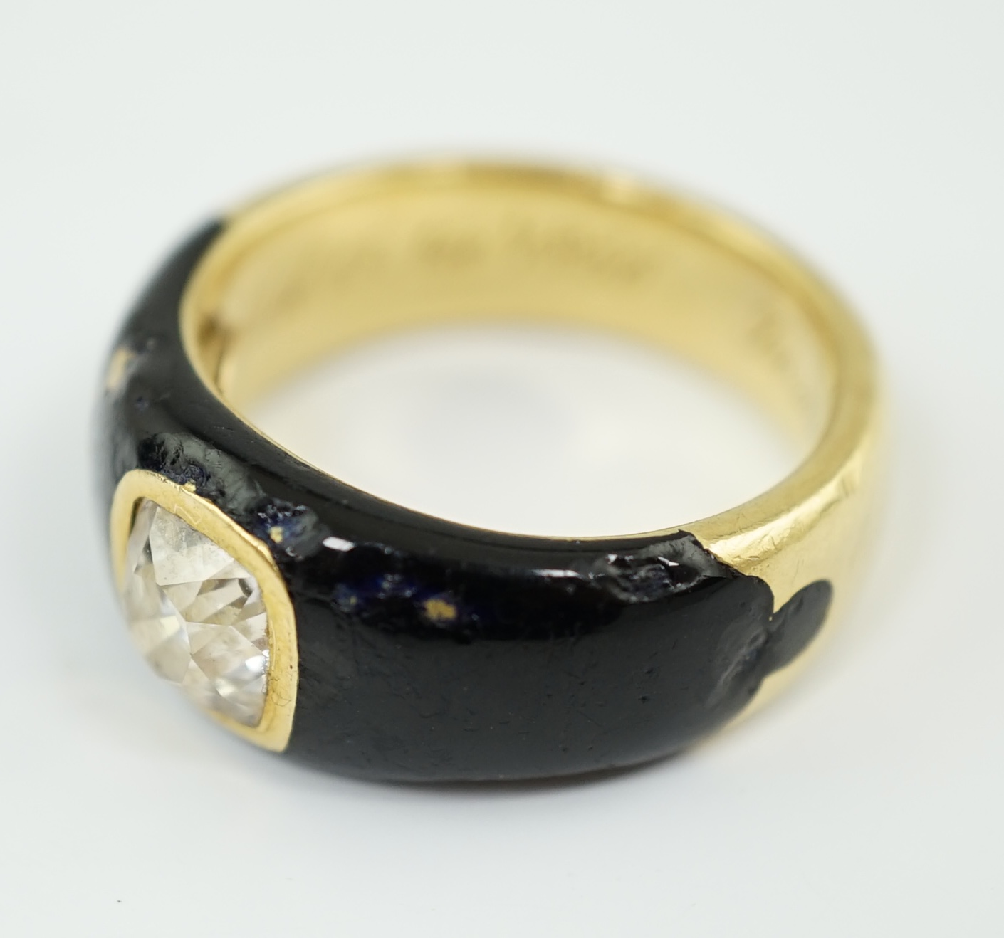 A Victorian gold, black enamel and old mine cut solitaire diamond set mourning ring